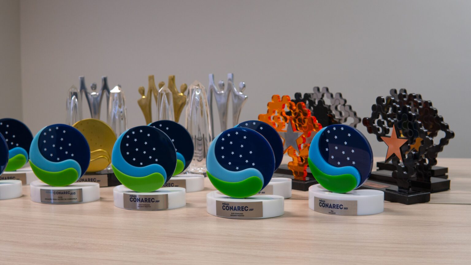 Troféus recebidos pela Olos